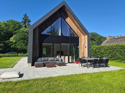 Spacious forest villa with a very generous living area and a large garden