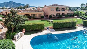 A large, two-story house with a swimming pool in the foreground. - Cpg- Perfect Holiday Home Close to Puerto Banus (Marbella)