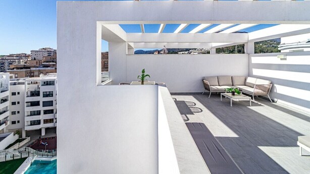 A rooftop terrace with a pool, outdoor seating, and a view of the cityscape. - Eg54a - Luxury Penthouse With Private sun Terrace (Estepona)