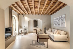Apartment (2 Bedrooms) | Living area | 32-inch Smart TV with cable channels