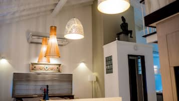 Family Quadruple Room | Living area