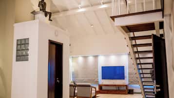 Family Quadruple Room | Living area