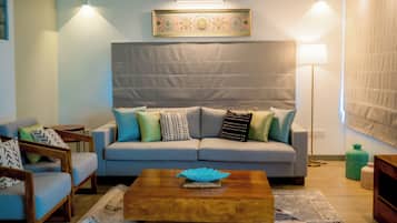 Family Quadruple Room | Living area