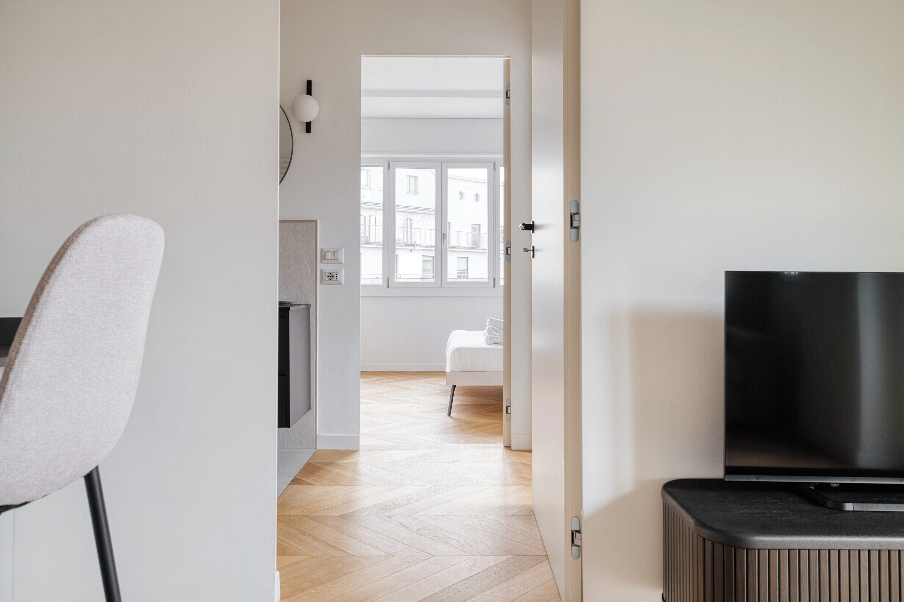 Apartamento, 3 habitaciones, balcón | Zona de estar | Smart TV de 32 pulgadas con canales por cable