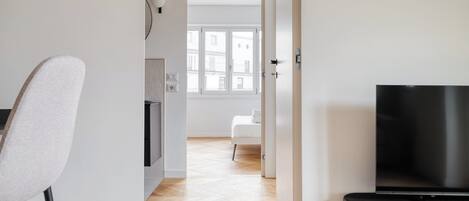 Apartment, 3 Bedrooms, Balcony | Living area | 32-inch Smart TV with cable channels