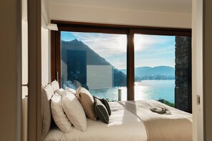 อพาร์ทเมนท์, วิวทะเลสาบ | เครื่องนอนระดับพรีเมียม, ผ้านวมขนเป็ด, เตารีด/โต๊ะรีดผ้า