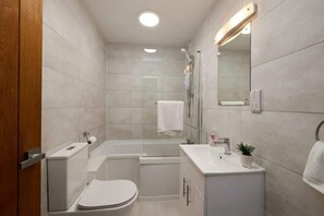 Hair dryer, towels, soap, shampoo