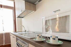 Refrigerador, microondas, tostadora