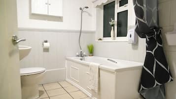 Hair dryer, towels, soap, toilet paper