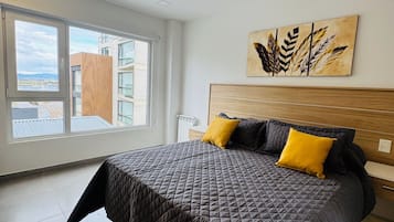Premium bedding, down comforters, pillowtop beds, minibar