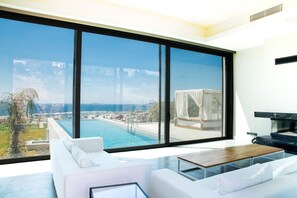 Deluxe villa, uitzicht op zee | Woonruimte