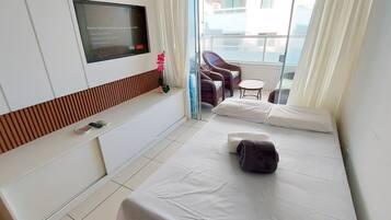 Apartment | Living area | 32-inch Smart TV with digital channels, streaming services