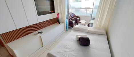 Apartment | Living area | 32-inch Smart TV with digital channels, streaming services