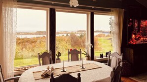 House, 2 Bedrooms, Accessible, Smoking | Dining room - Cheerful Cabin With Sauna and Great Views (Hustadvika)