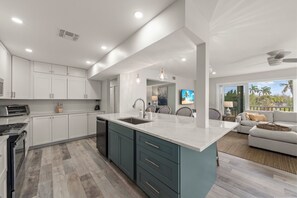 Fridge, microwave, oven, stovetop - Surfside 12A2 | Luxury Beachview Living on Sanibel (Sanibel)