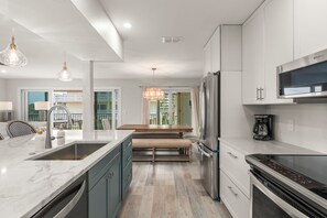 Fridge, microwave, oven, stovetop - Surfside 12A2 | Luxury Beachview Living on Sanibel (Sanibel)