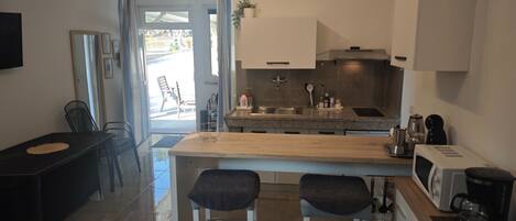 Fridge, microwave, coffee/tea maker, toaster