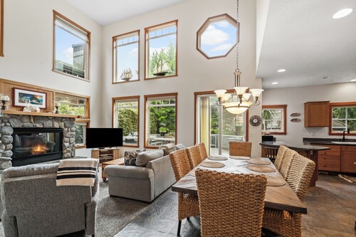 Cozy fireside retreat by Proposal Rock with ocean views, sun.