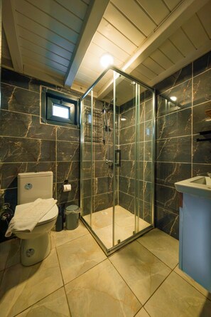 Bungalow, Patio, Garden Area | Bathroom | Free toiletries, hair dryer, towels, shampoo