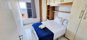 Apartamento básico | Wi-Fi de cortesia, roupa de cama