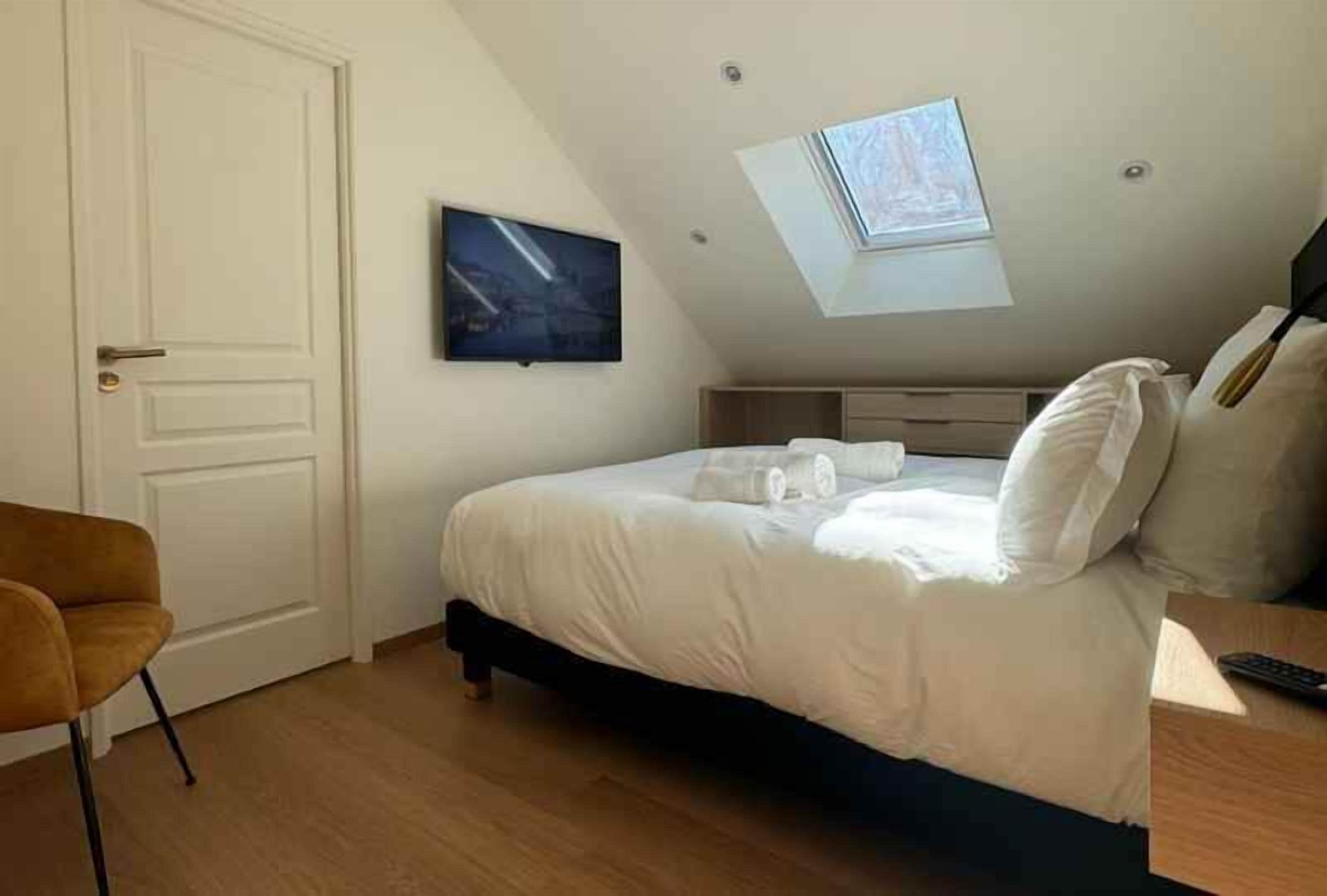 Blackout curtains, iron/ironing board, free WiFi