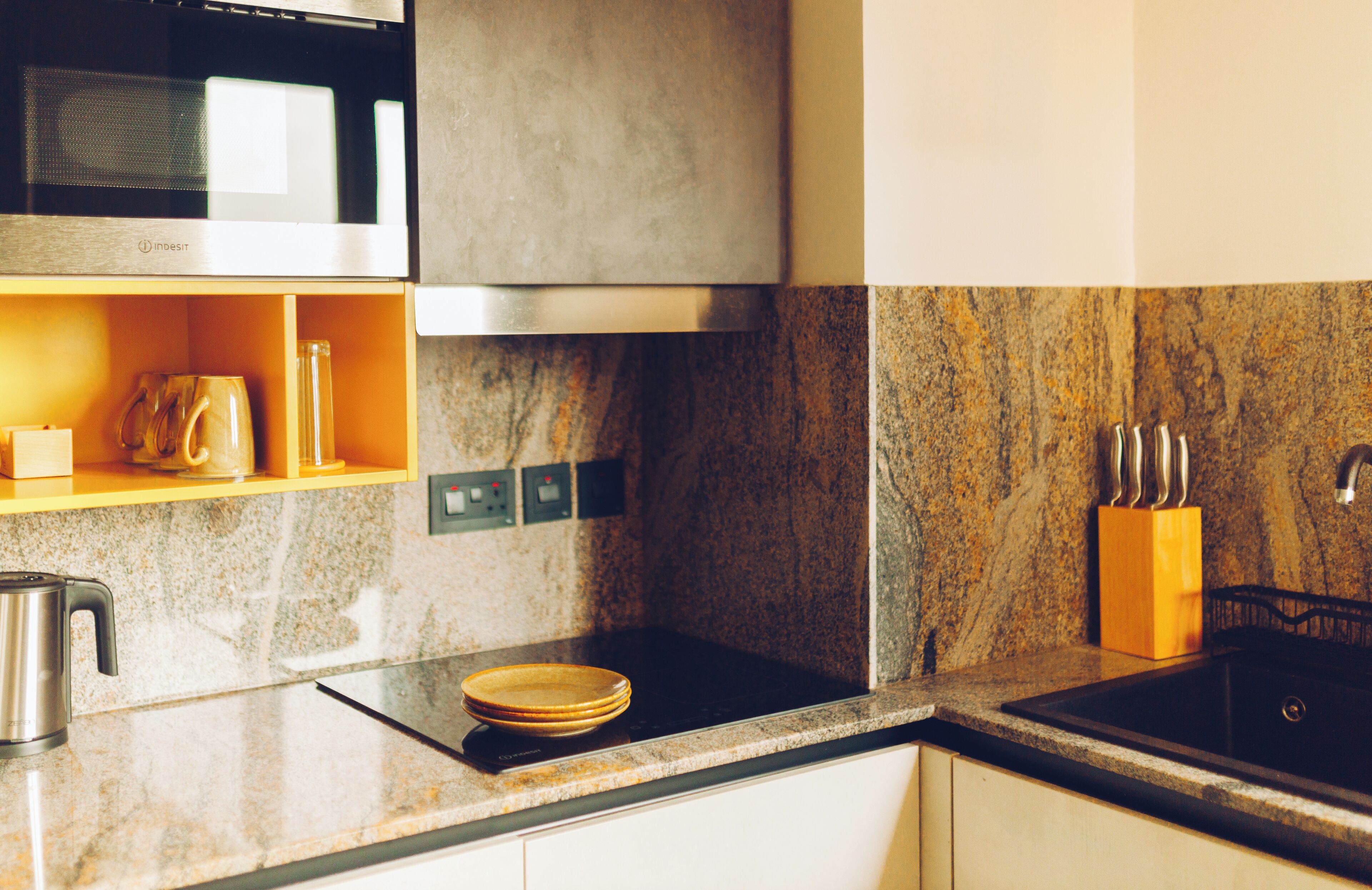 Deluxe Apartment, Balcony, Hill View | Private kitchen | Microwave, stovetop, high chair, cookware/dishes/utensils