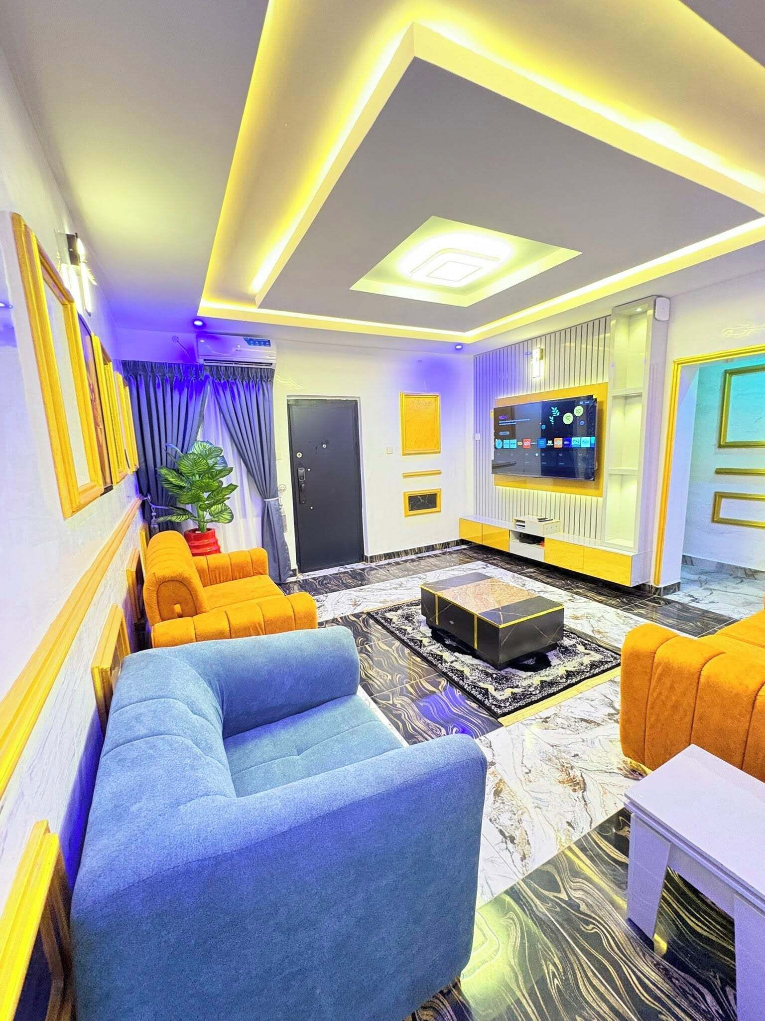 Apartamento família, sacada, vista para a cidade | Área de estar