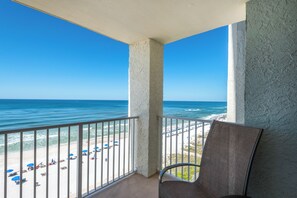 A balcony with a view of the beach and ocean. - Last minute booking discounts! 2 Bedroom, Beachfront Condo & Free Beach Chairs (Panama City Beach)
