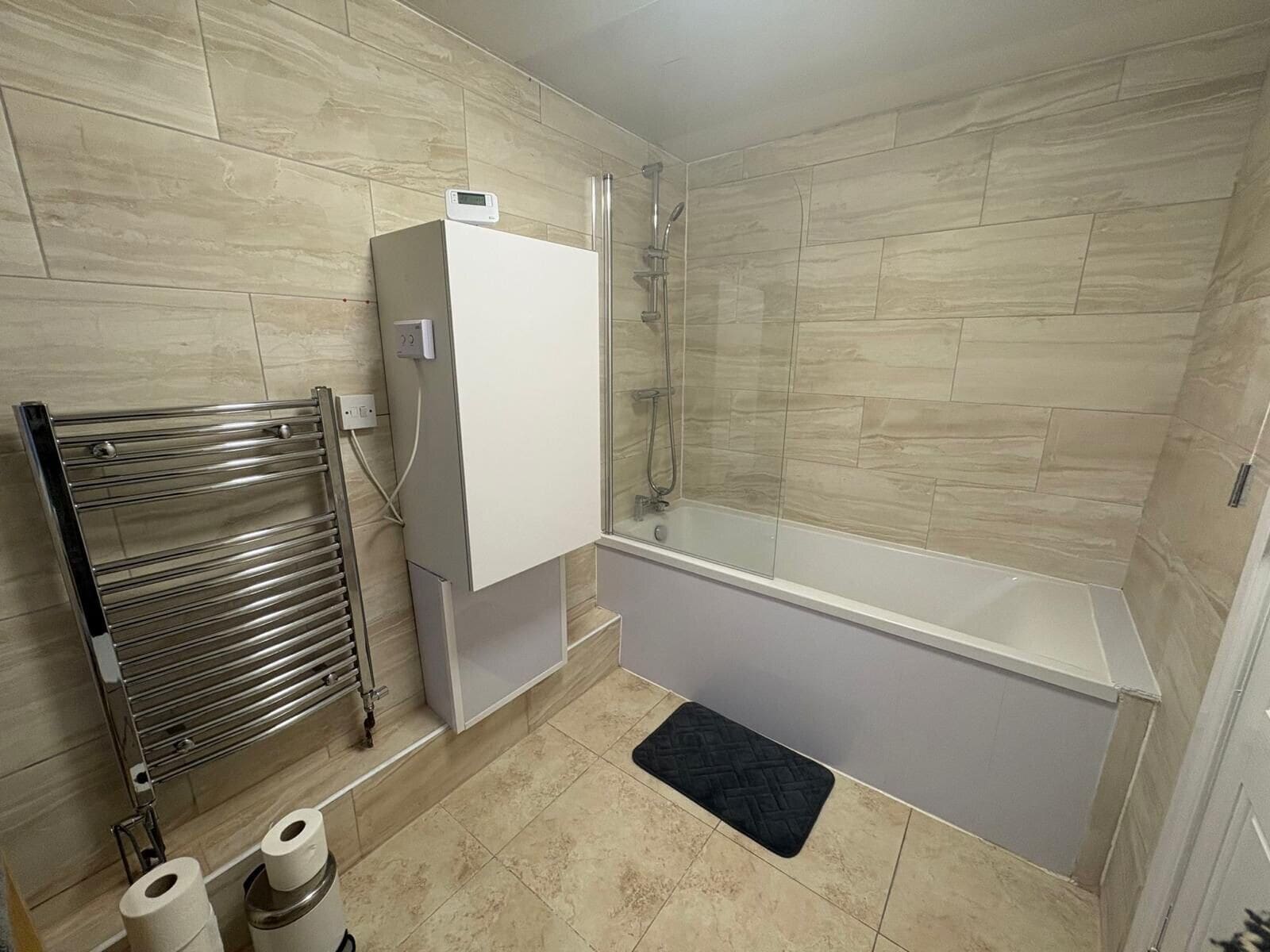 Shower, free toiletries, towels, toilet paper