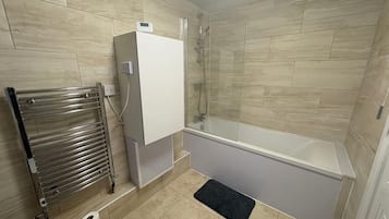 Shower, free toiletries, towels, toilet paper