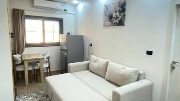 Family Studio, Sea View | Living area