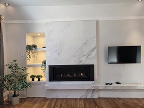 Signature-Suite, 3 Schlafzimmer, Whirlpool, Stadtblick | Wohnzimmer