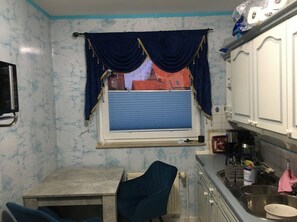 Private kitchen - Exclusive 3-room apartment with garden and large covered terrace (Beckedorf)