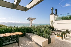 Outdoor dining - Rooftop Pool | Smart TV 55" #CAJU03 (Florianópolis)