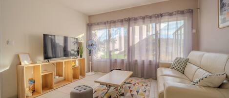 Perhehuoneisto, näköala puutarhaan | Oleskelualue | Älytelevisio, leluja, lämmitetyt lattiat