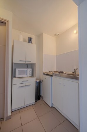 Familie appartement, uitzicht op tuin | Privékeuken