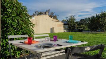 Familie appartement, uitzicht op tuin | Terras