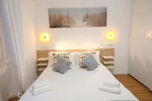 1 habitación, tabla de planchar con plancha, wifi gratis y ropa de cama 