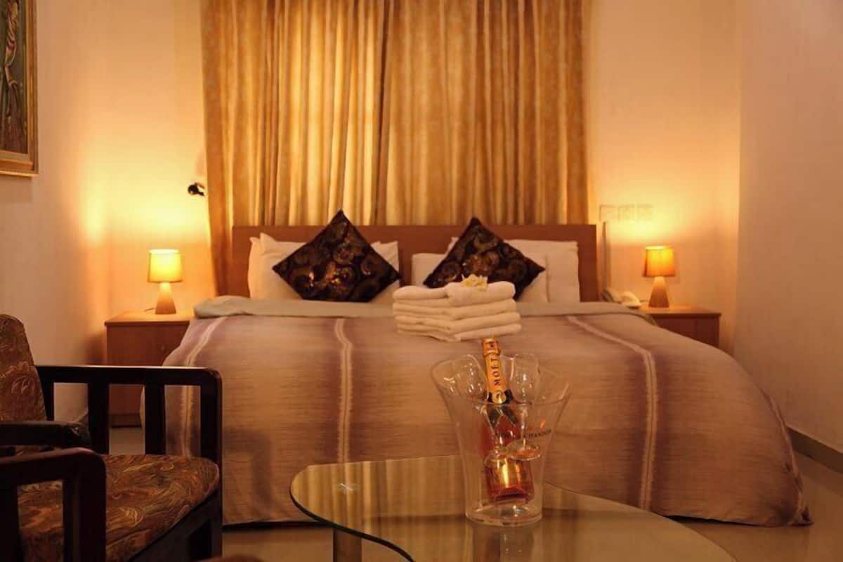 Economy Room, Balcony, City View | Desk, laptop workspace, blackout drapes, soundproofing