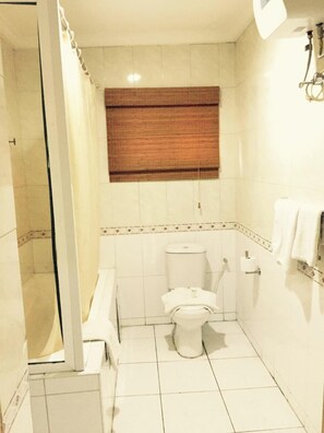 Economy Room, Balcony, City View | Bathroom | Free toiletries, hair dryer, towels, soap