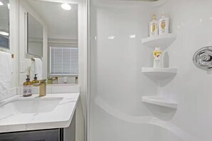 Comfort Room | Bathroom | Shower, hair dryer, towels, soap - Rucker Avenue Cozy Bungalow (Everett)