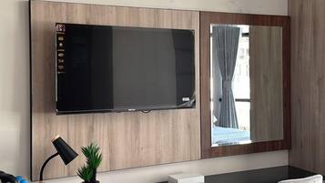 Standard-Dreibettzimmer, Stadtblick | Wohnbereich