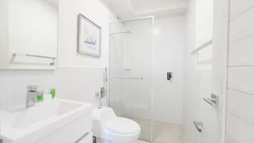 Shower, hair dryer, towels, soap