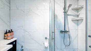 Shower, hair dryer, towels, soap