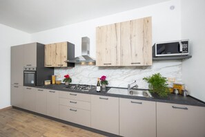 Fridge, microwave, oven, dishwasher
