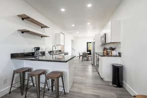 Fridge, microwave, oven, stovetop - Modern retreat in Fort Peck, minutes away from the Marina! Pet Friendly! (Fort Peck)