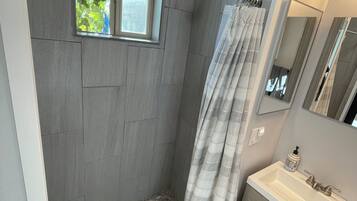 Hair dryer, towels, soap, toilet paper