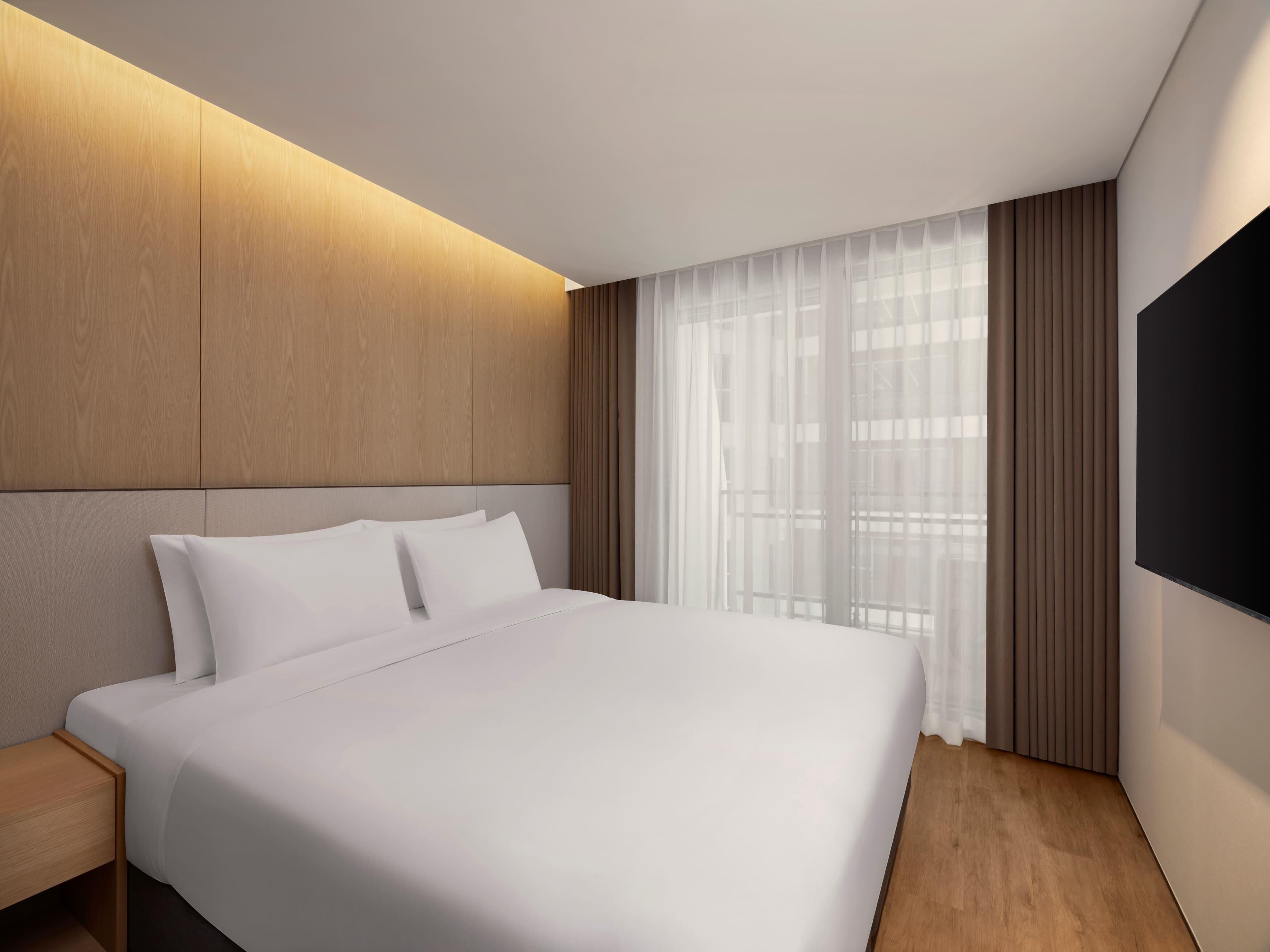 Deluxe King Ocean View | Caja fuerte, tabla de planchar con plancha, wifi gratis y ropa de cama