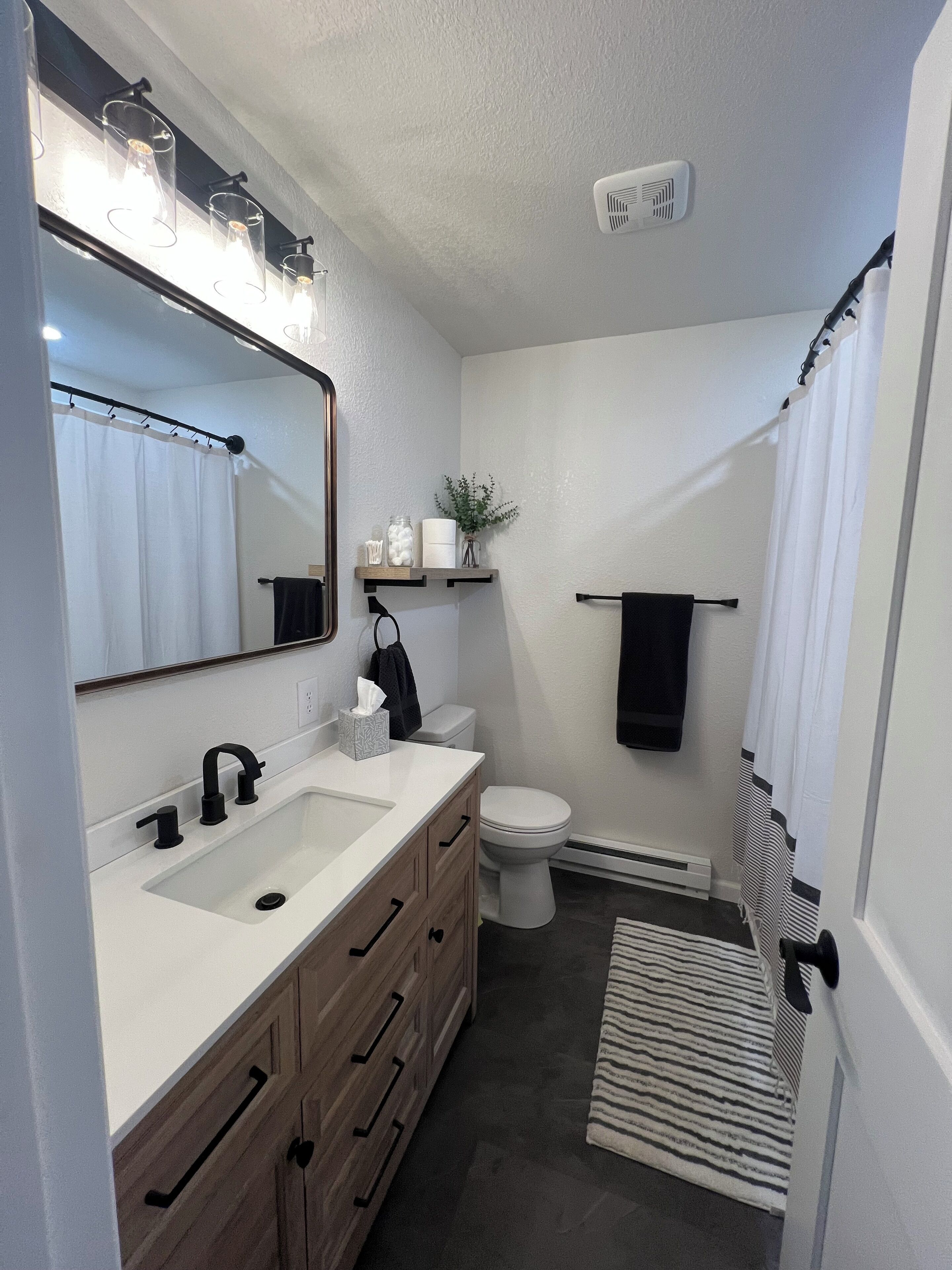 Hair dryer, towels, soap, toilet paper