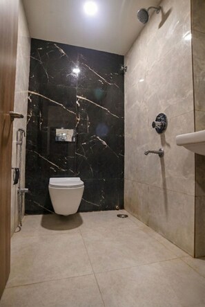 Standard Room | Bathroom | Shower, free toiletries, towels, soap - The Cliff Hotel (Indore)